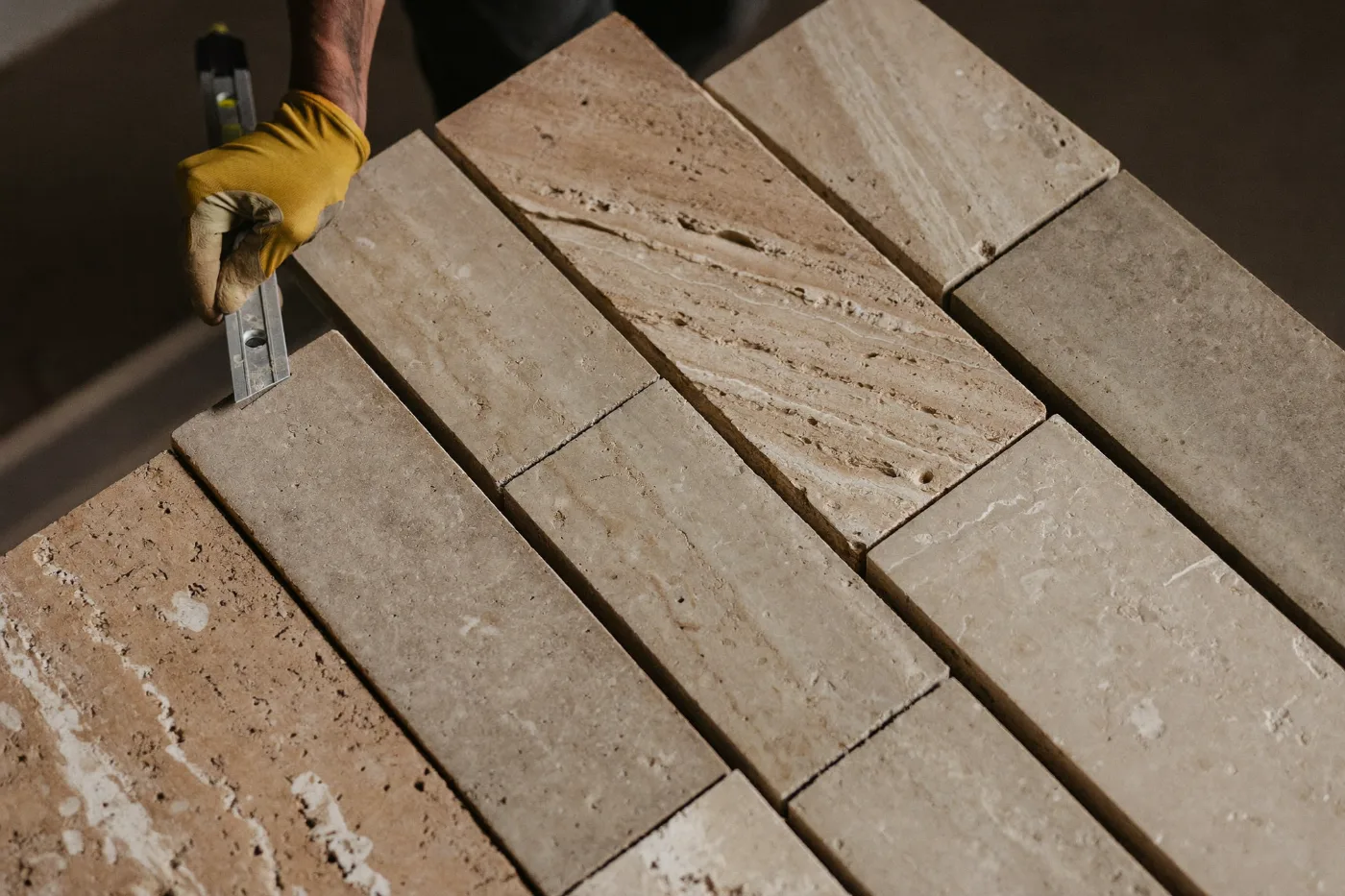 Close detail of natural stone cladding with tight, even grout joints